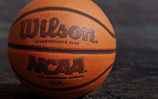 Image of an orange and black Wilson basketball