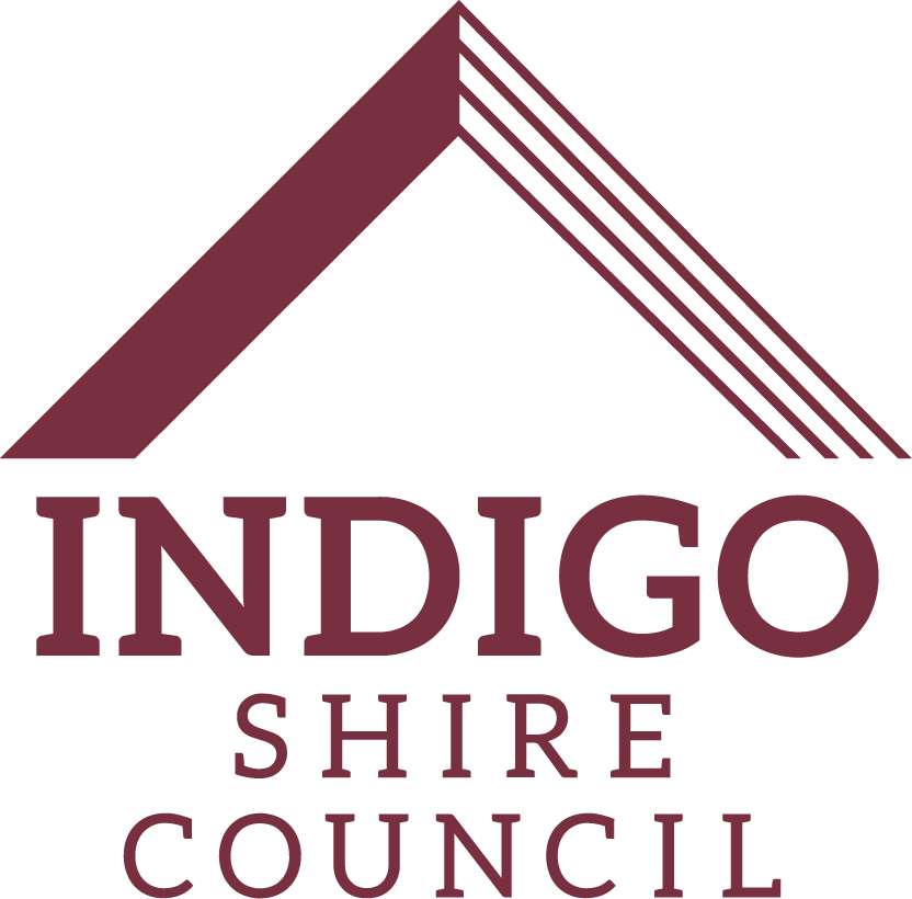 Logo of Indigo Shire Council featuring a stylized roof design in maroon and the text "Indigo Shire Council" below.