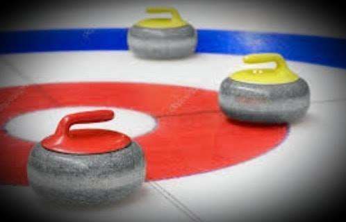 a white floor marked out for floor curling with equipment.