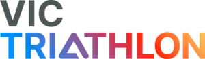 Logo of "VIC Triathlon" featuring the word "VIC" in gray and "TRIATHLON" in a gradient of colors from blue to orange.